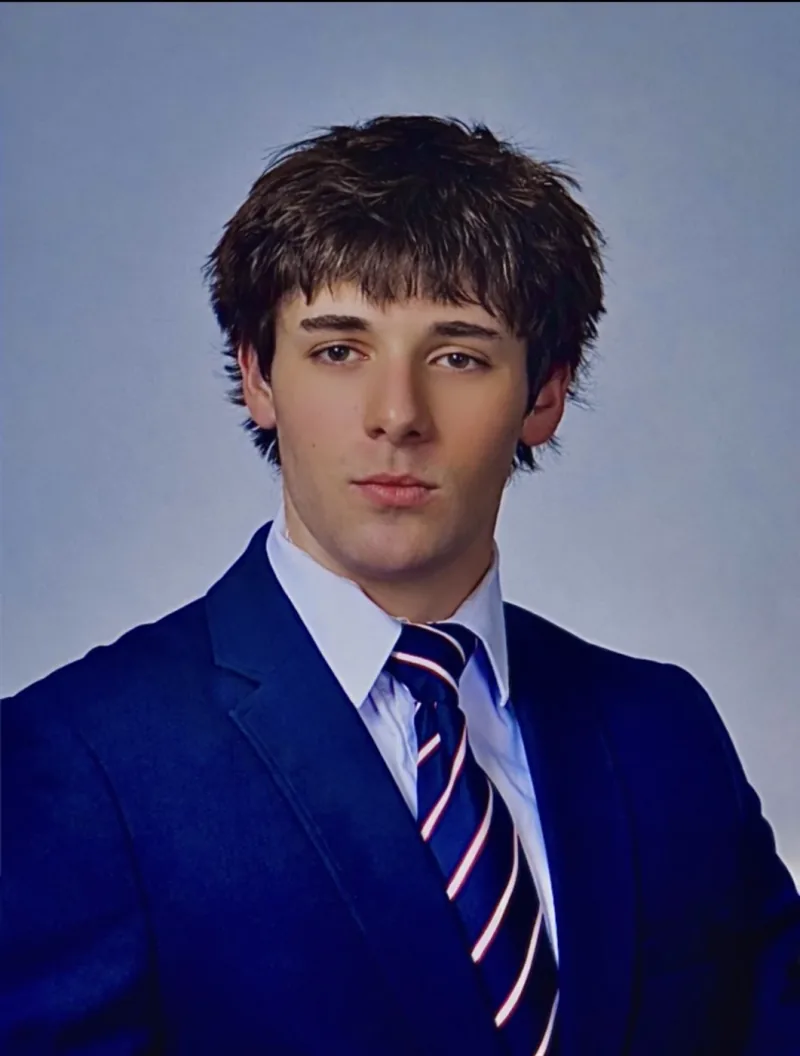 Professional headshot of Davis Higgins